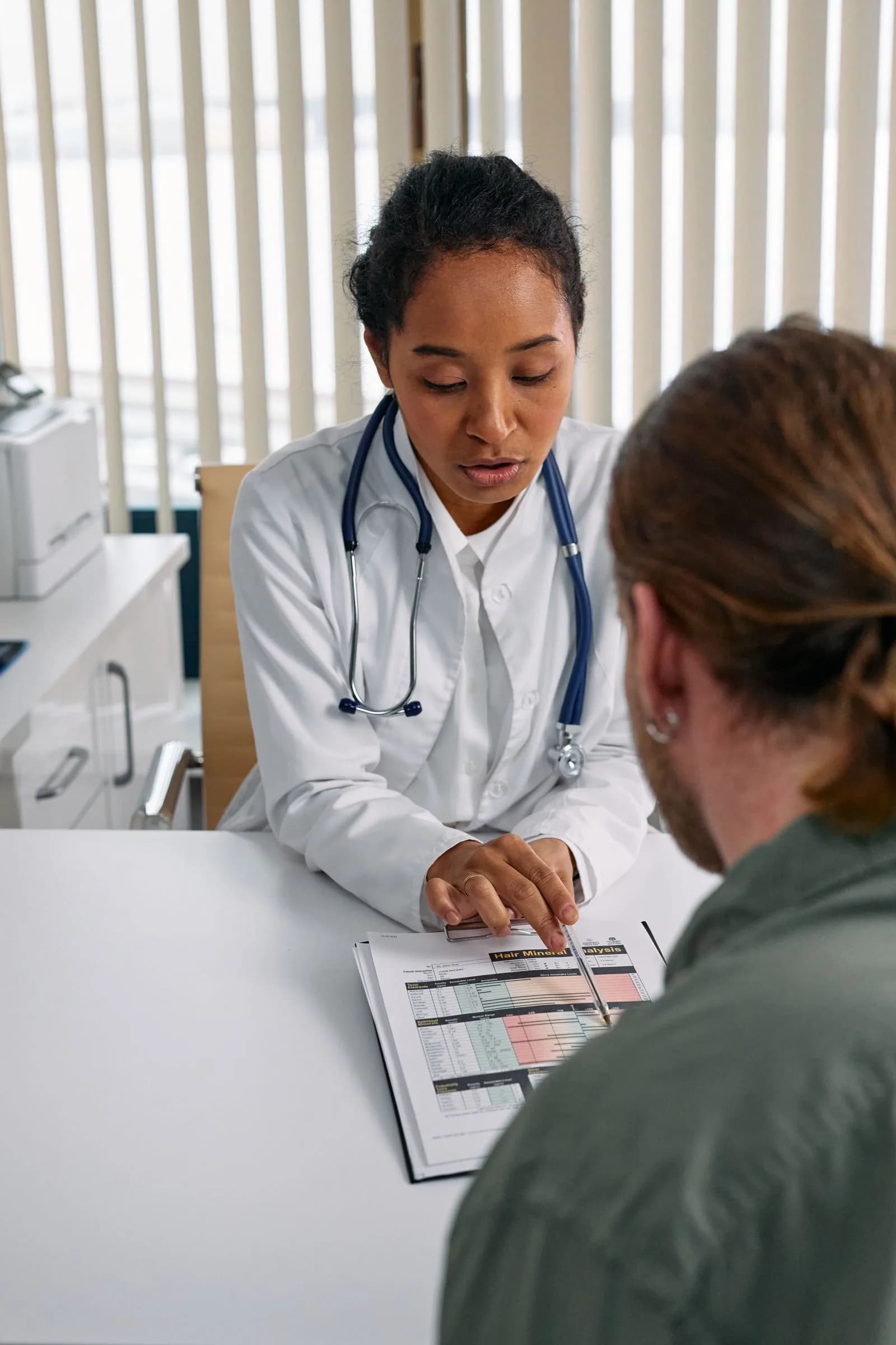 Doctor consulting patient — Healthcare & Medical marketing by TML Agency