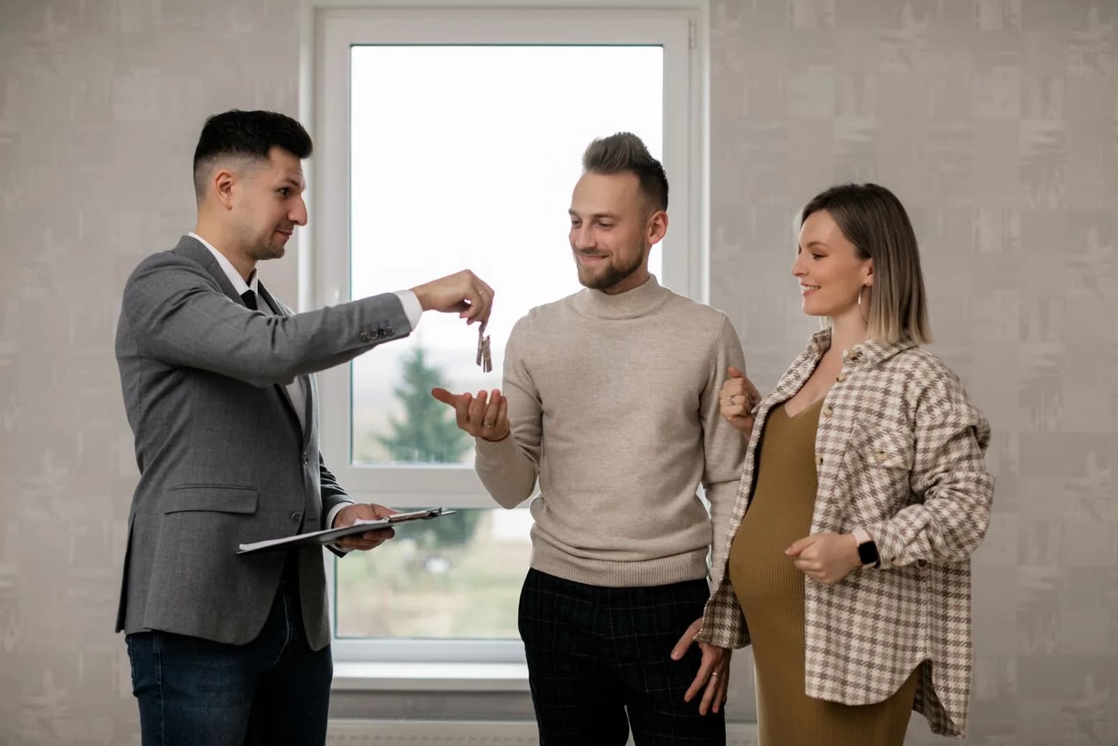 New homeowners completing their purchase — Real Estate marketing by TML Agency